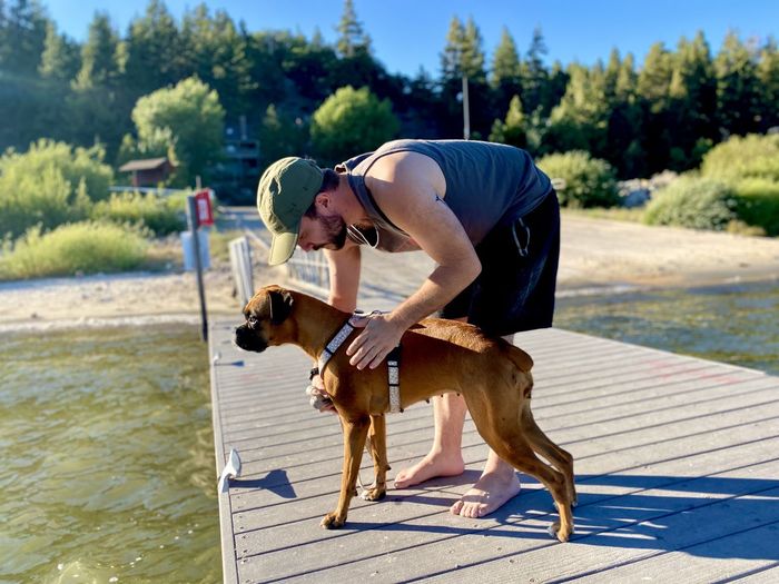 Man and dog at lake