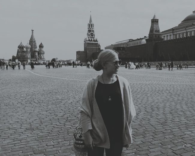 Woman standing in city