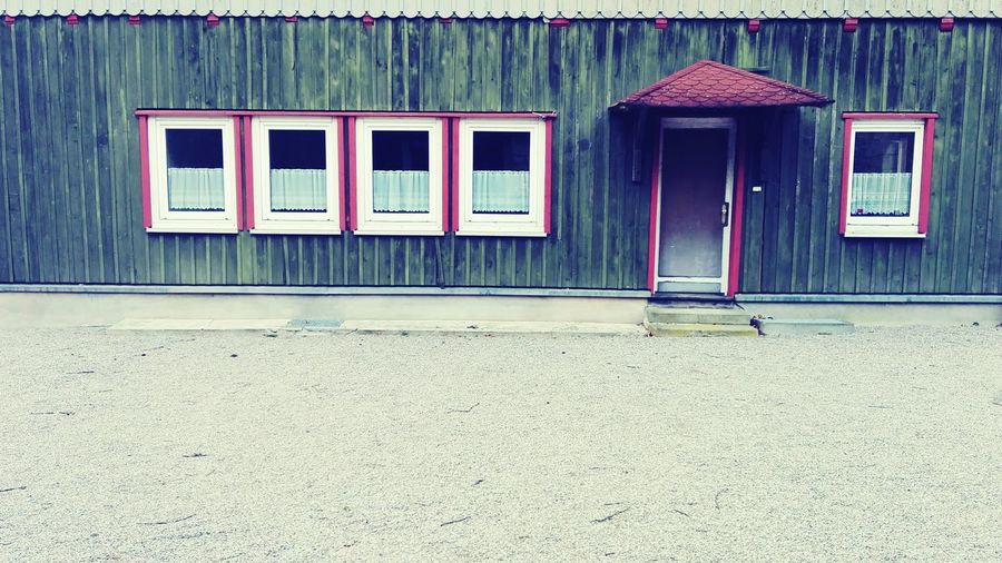 Closed door and windows of house