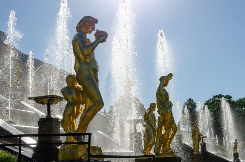 Gilded statues at the grand cascade of the peterhof palace in petergof, st petersburg, russia.