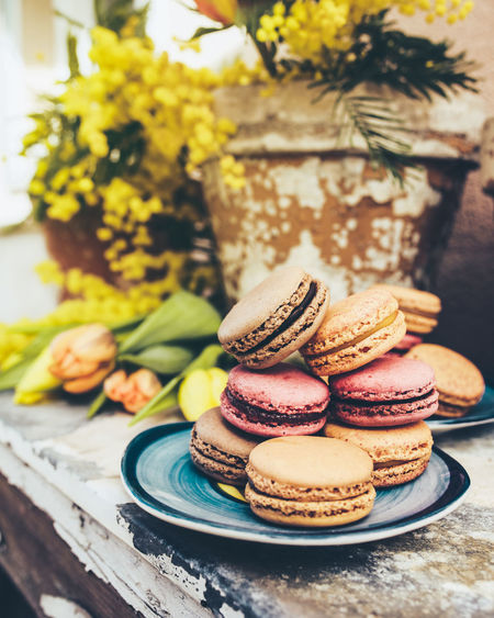 Close-up of macarons in plate on table