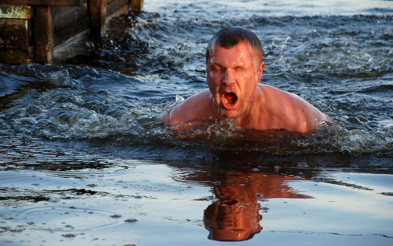 Portrait of man swimming in water
