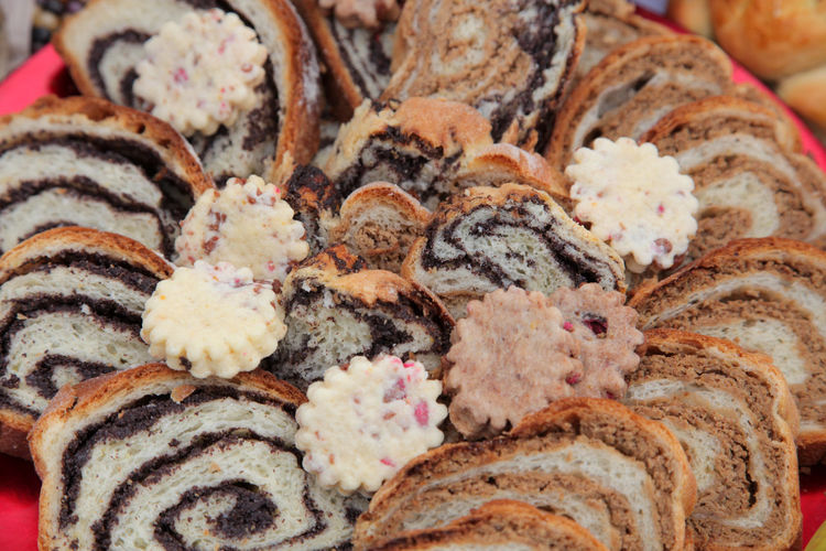Close-up of poppy seed and walnut rolls during christmas
