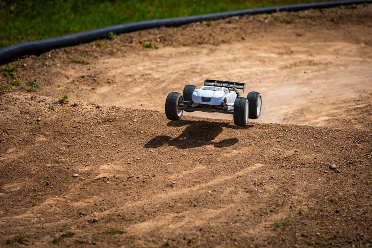Rc car driving on an offroad outdoor track

