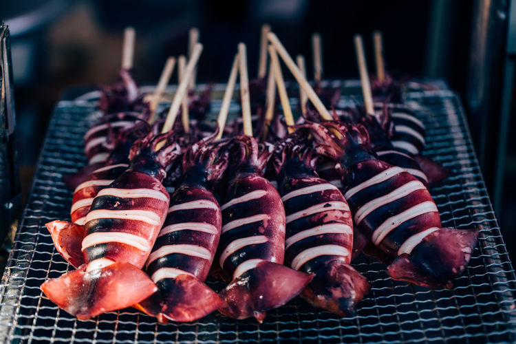 High angle view of meat on barbecue grill