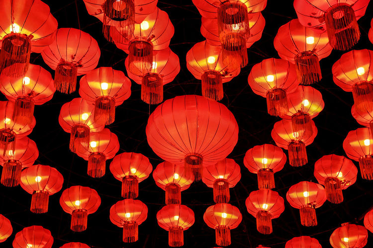 Illuminated lanterns hanging at night