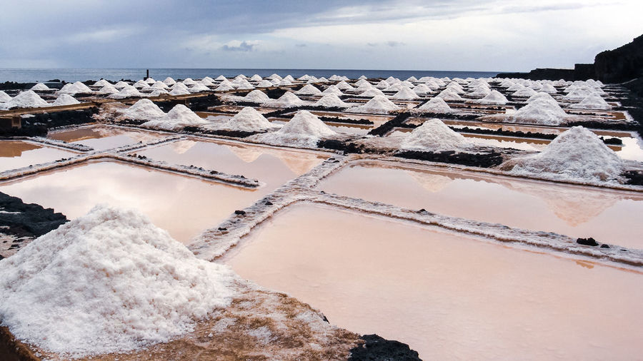 Traditional open air sea salt production at the coast of la palma, canary islands, spain