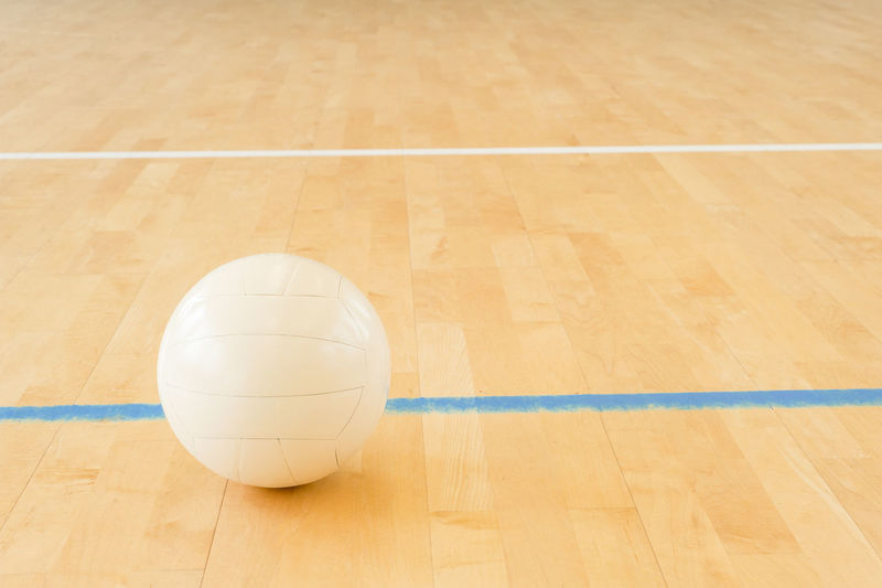Close-up of on volleyball on court