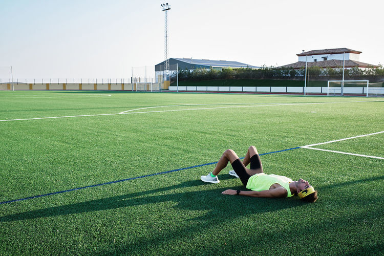 Man lying on field