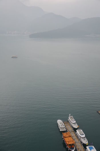 Scenic view of lake during foggy weather