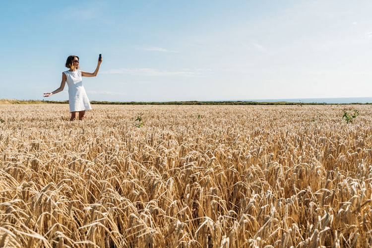 Summer concept, caucasian middle-aged woman in the countryside