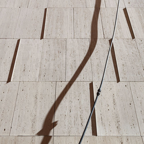 High angle view of shadow on floor