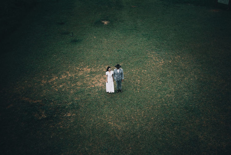High angle view of couple on field