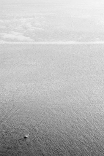 Aerial view of sailboats in sea