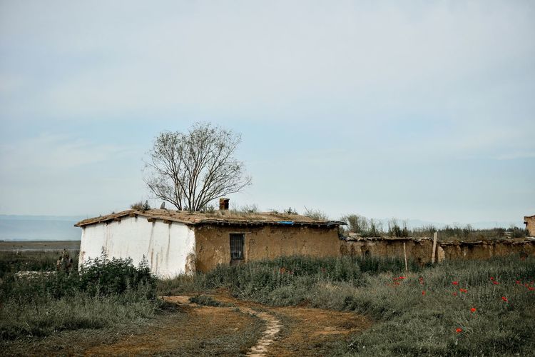 Abandoned nomad's adobe farmhouse in xinjiang