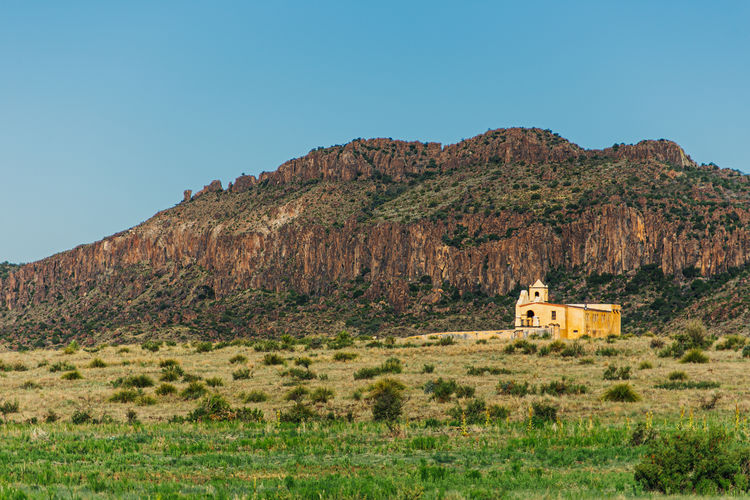 Scenic view of mountains against clear sky