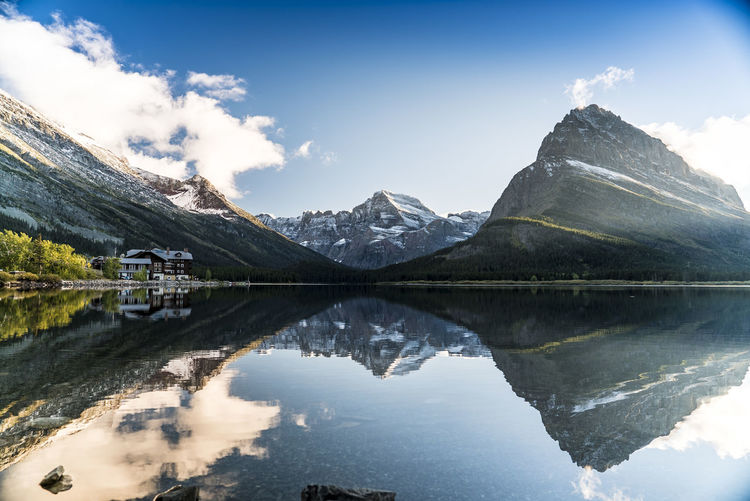 Scenic reflection of mountains in calm lake