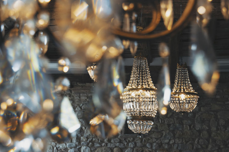 Close-up of gold crystal chandeliers electric lamp