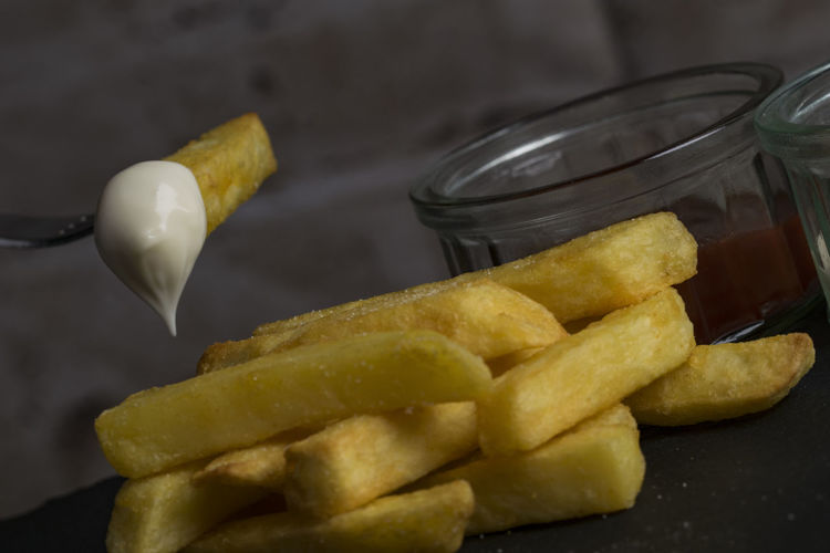 Close-up of french fries with ketchup