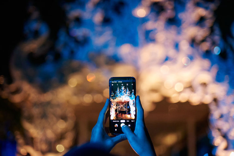 Close-up of hand holding smart phone