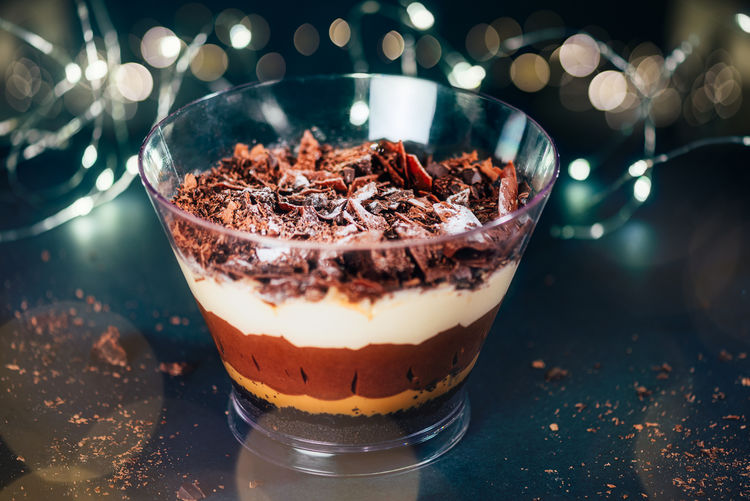 Xmas dessert. family pot of layered billionaires dessert, chocolate and caramel mousse layers