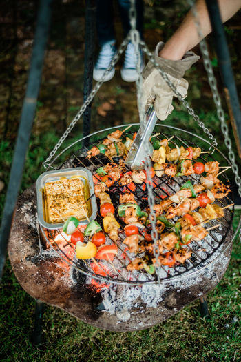 High angle view of meat on barbecue grill
