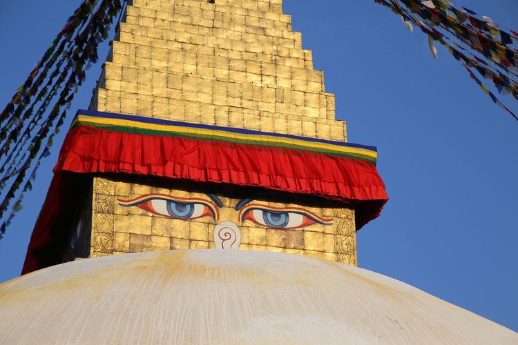 Low angle view of bodnath stupa against sky