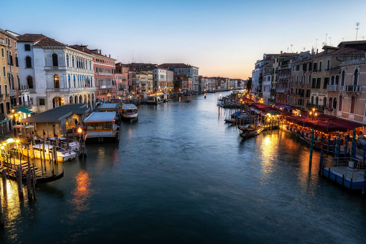 Grand canal at sunset viewed over the rialto bridge, venice, italy
