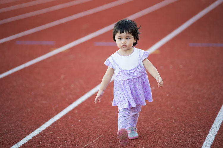 Portrait of girl running
