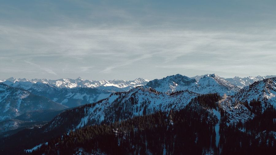 Scenic view of snowcapped mountains against sky