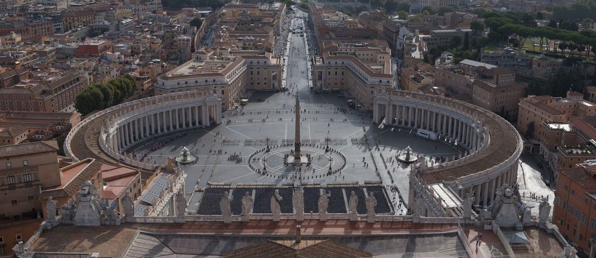A panoramic view of st peters square from the cupola of st peters basilica, vatican city.