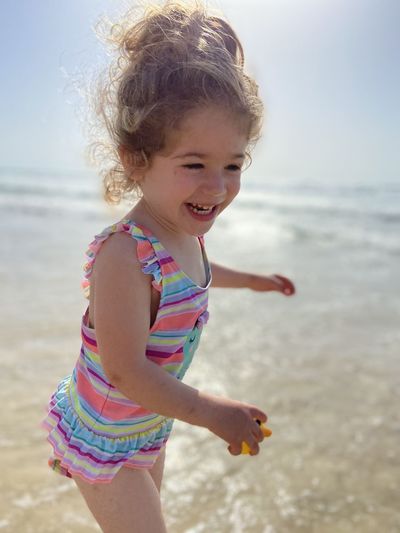 Cute girl enjoying on beach