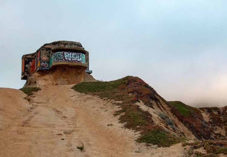 Low angle view of a bunker on the coast