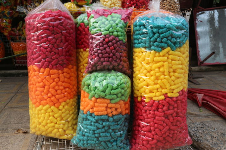 Close-up of multi colored candies for sale in market