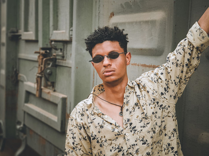 Portrait of young man wearing sunglasses