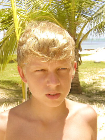 Portrait of young boy on the beach