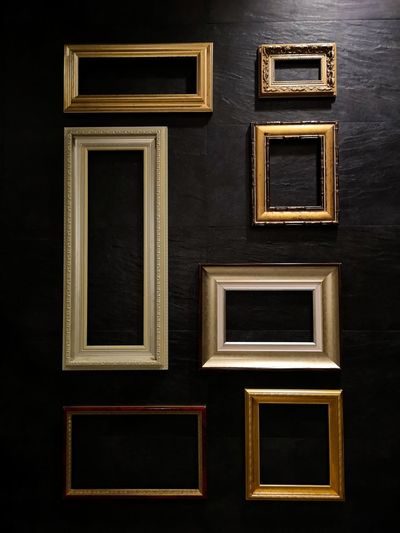 Full frame shot of wooden frames on the wall