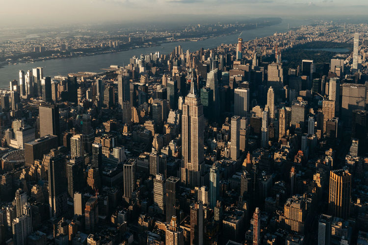 High angle view of modern buildings in city empire state building