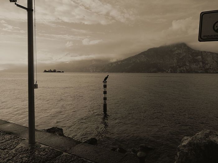 Scenic view of lake garda against sky
