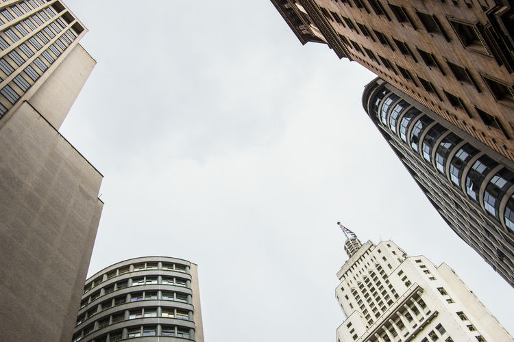 Low angle view of modern buildings against sky