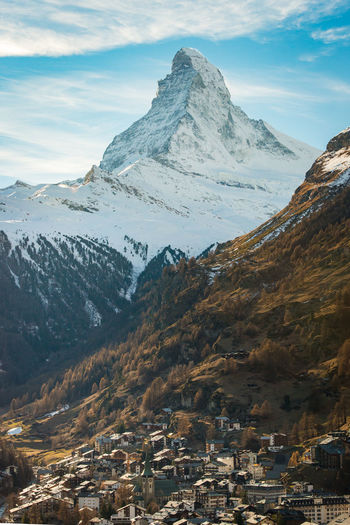 Scenic view of snowcapped mountains against sky