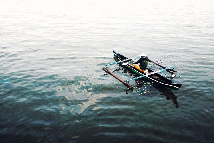 High angle view of boat moored in sea