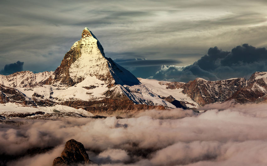 Scenic view of snowcapped mountain against sky