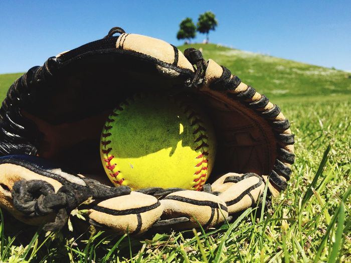 Close-up of baseball glove and ball