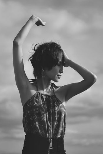 Low section of woman standing outdoors