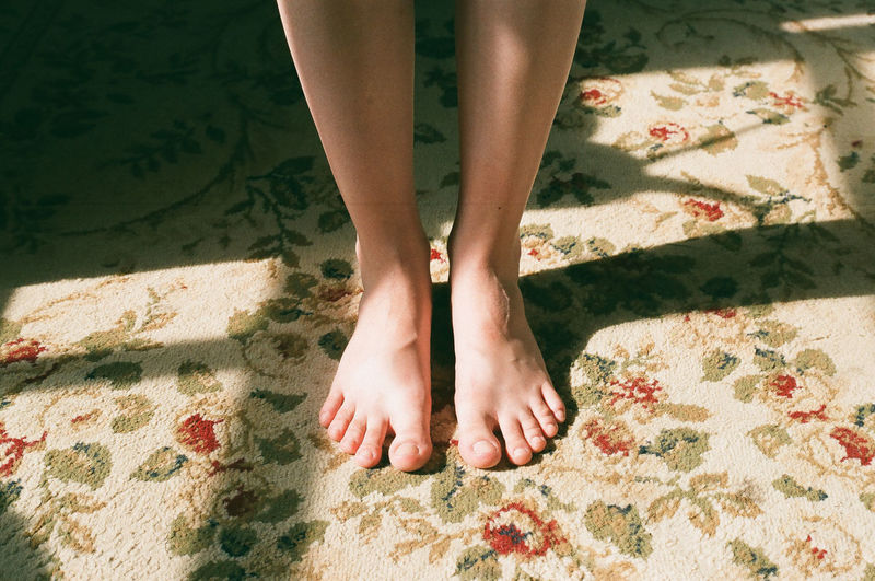 Low section of woman feet