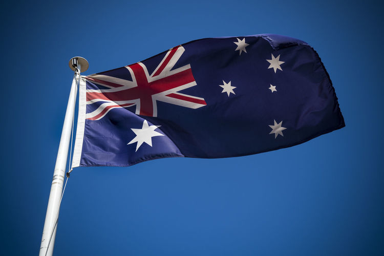 Low angle view of australian flag against sky