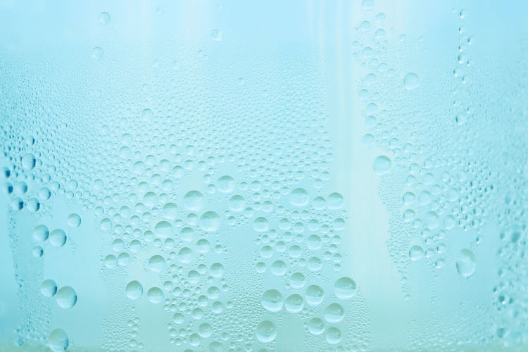 Full frame shot of wet glass