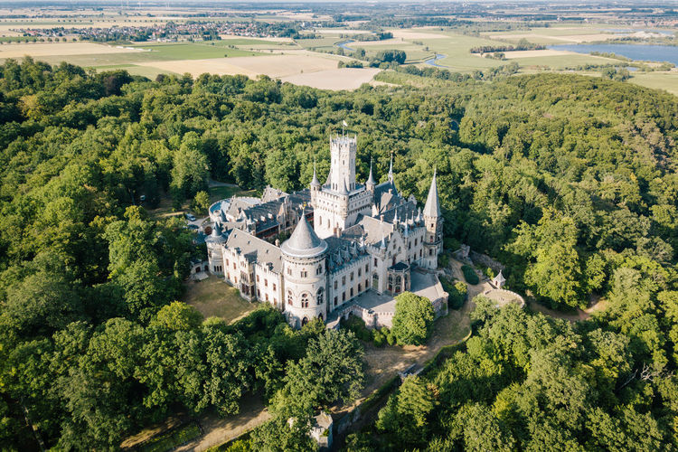 High angle view of marienburg castle amidst trees 