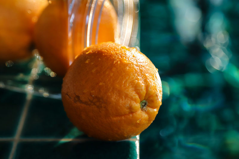 Close-up of orange slice in water